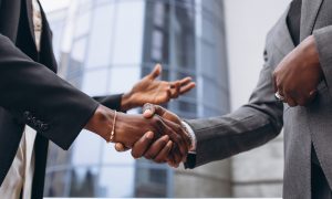 African business male people shaking hands